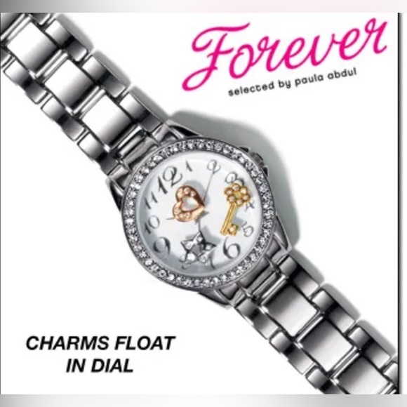 VGC Vintage AVON Floating Charms Silver tone Wristwatch. - Picture 3 of 16